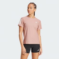 Koszulka Own The Run. Czerwone t-shirty damskie Adidas, xs, bez wzorów, z materiału, bez kołnierzyka. Za 159.00 zł.