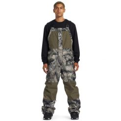 Spodnie snowboardowe męskie DC Shoes Shadow 15K kombinezon. Zielone spodnie materiałowe męskie DC Shoes, bez wzorów, z poliesteru, sportowe. Za 585.00 zł.