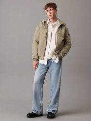 Calvin Klein Kurtka softshellowa w kolorze jasnozielonym rozmiar: S. Zielone kurtki outdoor męskie CALVIN KLEIN, s, z aplikacjami, z poliamidu, bez kaptura. Za 440.95 zł.