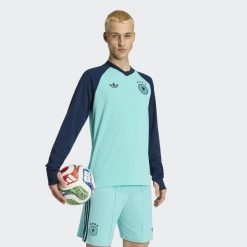 Bluza Germany 26 Away Pre-Match Warm. Niebieskie bluzy bez kaptura męskie Adidas, z dzianiny. Za 479.00 zł.