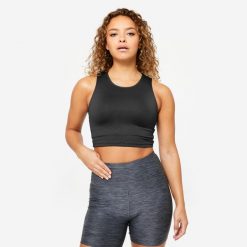 Koszulka fitness damska Domyos bez rękawów crop top. Niebieskie bluzki sportowe damskie DOMYOS, l, bez wzorów, z elastanu, bez ramiączek. Za 34.99 zł.