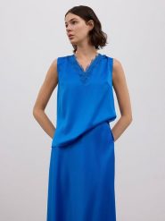 BGN Top w kolorze niebieskim rozmiar: 38. Niebieskie topy damskie BGN, bez wzorów, bez kołnierzyka. Za 56.99 zł.