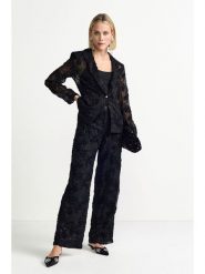 Rich & Royal Spodnie w kolorze czarnym rozmiar: 40. Czarne spodnie materiałowe damskie Rich & Royal, z aplikacjami, z materiału. Za 329.95 zł.