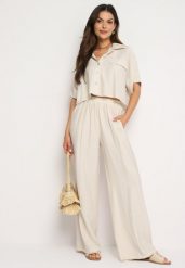 Beżowy Wiskozowy Komplet 2-Częściowy Luźna Koszula Spodnie z Szerokimi Nogawkami Ulvitela. Brązowe koszule damskie Born2be, bez wzorów, z wiskozy, eleganckie, bez kołnierzyka, bez ramiączek. Za 129.99 zł.