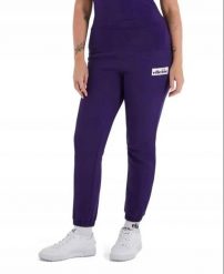 SPODNIE DAMSKIE DRESOWE ELLESSE SPORTOWE NIEBIESKIE. Niebieskie spodnie sportowe damskie Ellesse, m, z bawełny, na fitness i siłownię. Za 148.09 zł.