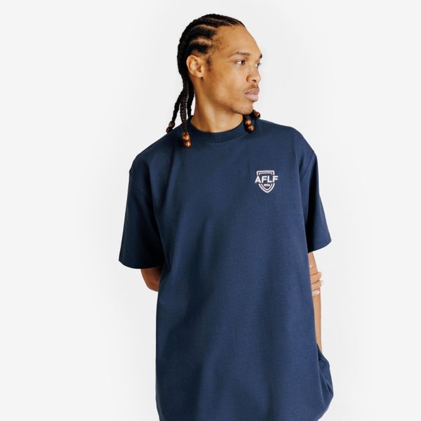 Koszulka z grafiką unisex Heritage. Niebieskie t-shirty damskie Decathlon, s, bez wzorów, z bawełny, bez kołnierzyka. Za 89.99 zł.