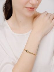 Pandora Pozłacana bransoletka rozmiar: 21. Żółte bransoletki damskie Pandora, pozłacane. Za 399.95 zł.