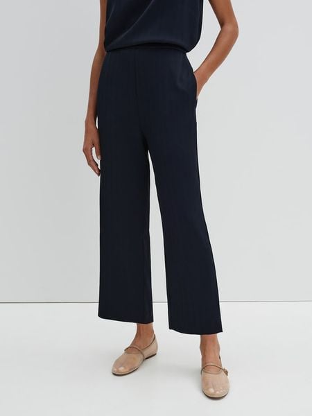 Someday Spodnie w kolorze granatowym rozmiar: 40. Niebieskie spodnie materiałowe damskie Someday, bez wzorów, z materiału, z podwyższonym stanem. Za 150.37 zł.