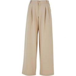 Szerokie Spodnie Damskie Z Plisą Z Przodu. Brązowe spodnie sportowe damskie Urban Classics. Za 155.99 zł.
