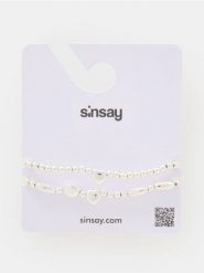 Bransoletka z błyszczącym wykończeniem 2 pack - srebrny. Szare bransoletki damskie Sinsay, srebrne. Za 12.99 zł.