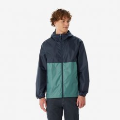 Kurtka turystyczna męska Quechua Raincut zamek wodoodporna. Niebieskie kurtki męskie QUECHUA, l, bez wzorów, z materiału, sportowe, bez kaptura. Za 69.99 zł.