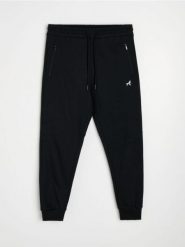 Spodnie dresowe regular jogger - czarny. Czarne spodnie sportowe męskie Sinsay, z dresówki. Za 59.99 zł.