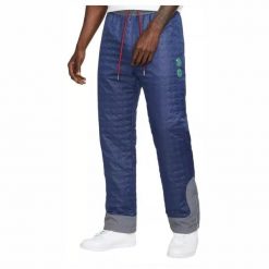 Męskie spodnie wodoodporna CLOT X WOVEN PANT NAVY / FLINT GREY / STORMRED. Niebieskie spodnie materiałowe męskie Jordan, z aplikacjami, z nylonu. Za 462.85 zł.