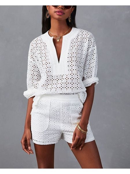 Milan Kiss Bluzka w kolorze białym rozmiar: M. Białe bluzki damskie Milan Kiss, m, bez wzorów, bez kołnierzyka, bez ramiączek. Za 176.08 zł.