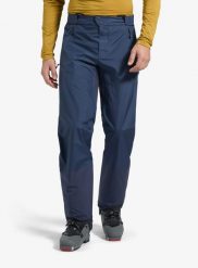 Spodnie w góry męskie La Sportiva Crossridge Evo Shell Pant. Niebieskie spodnie materiałowe męskie La Sportiva, bez wzorów, z materiału, eleganckie. Za 1,033.99 zł.