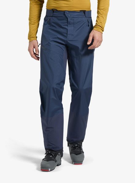 Spodnie w góry męskie La Sportiva Crossridge Evo Shell Pant. Niebieskie spodnie materiałowe męskie La Sportiva, bez wzorów, z materiału, eleganckie. Za 1,033.99 zł.