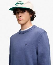 Superdry Sweter Preppy z bawełny – relaxed fit. Niebieskie swetry męskie Superdry., s, z aplikacjami, z bawełny, bez kołnierzyka. Za 379.95 zł.