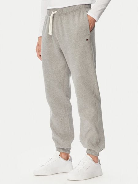 Tommy Hilfiger Spodnie dresowe Essential MW0MW37231 Szary Regular Fit. Szare spodnie dresowe męskie Tommy Hilfiger, bez wzorów, z dresówki. Za 449.99 zł.