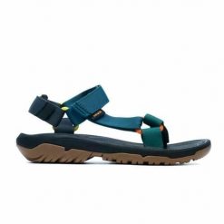 Buty do chodzenia męskie Teva Hurricane Xlt2. Niebieskie buty trekkingowe męskie Teva, z materiału, bez zapięcia, trekkingowe. Za 369.99 zł.