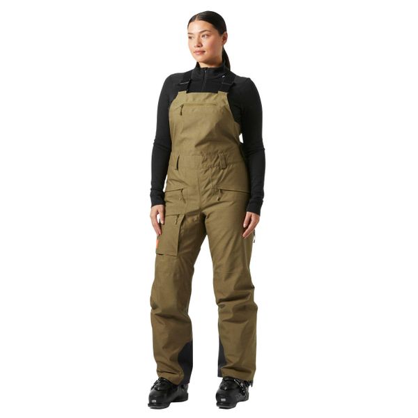 Kombinezon narciarski damski z szelkami Helly Hansen Powderqueen 2.0. Brązowe kombinezony damskie Helly Hansen, na zimę, bez wzorów, sportowe, bez kołnierzyka, bez ramiączek. Za 1,291.50 zł.