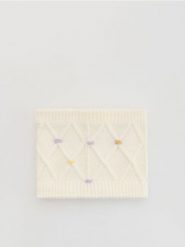 Komin z supełkami - złamana biel. Szaliki dziecięce Reserved, z dzianiny, bez ramiączek. Za 39.99 zł.