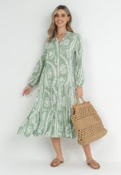 Jasnozielona Sukienka Oversize z Falbaną na Dole i Ornamentalnym Wzorem Amycia. Zielone sukienki damskie Born2be, m, z aplikacjami, retro, bez kołnierzyka, bez ramiączek, midi, oversize. W wyprzedaży za 119.99 zł.