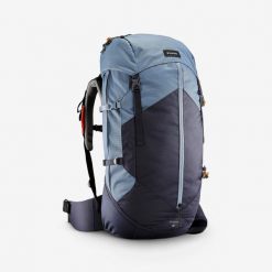Plecak trekkingowy damski Forclaz MT100 Easyfit 60 litrów. Niebieskie plecaki damskie FORCLAZ, bez wzorów, z poliesteru, sportowe. Za 349.99 zł.