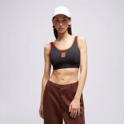 TOP DAMSKI PUMA-BRA TOP PUMA X VOGUE logo CZARNY. Czarne topy sportowe damskie Puma, uniwersalny, bez wzorów, z bawełny, bez ramiączek. Za 175.64 zł.