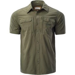 Męska treningowa koszula z krótkim rękawem militarna Magnum Battle. Zielone koszule męskie MAGNUM, m, bez wzorów, bez kołnierzyka, bez ramiączek. Za 190.45 zł.
