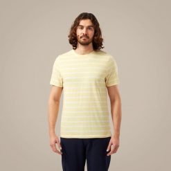 T-shirt Craghoppers Sten NosiBotanical – żółty, regular fit. Żółte t-shirty męskie CRAGHOPPERS, xl, bez wzorów, z bawełny, bez kołnierzyka. Za 96.05 zł.
