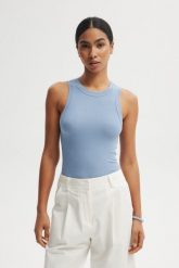 TOP GWEN BŁĘKITNY S - Flawless. Niebieskie topy damskie Flawless, s, bez wzorów, z bawełny, bez kołnierzyka. Za 259.00 zł.
