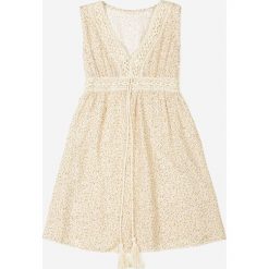 Beżowa Sukienka Chloriopis. Brązowe sukienki dziewczęce Born2be, na lato, z aplikacjami, z tkaniny, bez ramiączek, długie, maxi. Za 29.99 zł.