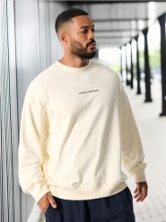 Bluza z napisem - kremowy. Białe bluzy bez kaptura męskie Sinsay, l. W wyprzedaży za 29.99 zł.