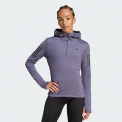 Bluza Own The Run Winterized Hooded Half-Zip. Fioletowe bluzy z kapturem damskie Adidas, m. Za 227.99 zł.