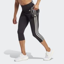 Damskie legginsy z wysoką talią adidas Designed To Move 3-Bandes 3/4 Sport. Białe legginsy damskie Adidas, xl, bez wzorów, z elastanu. Za 179.80 zł.