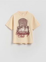 T-shirt z nadrukiem i haftem - kremowy. Białe koszulki dziewczęce Reserved, bez wzorów, z bawełny, bez ramiączek. Za 39.99 zł.