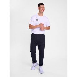 Spodnie hmlGO 2.0 SWEATPANTS. Czarne spodnie dresowe męskie HUMMEL, bez wzorów, z dresówki. Za 191.00 zł.