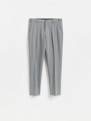 Garniturowe spodnie slim fit - ciemnoszary. Szare spodnie wizytowe męskie Reserved, z tkaniny. Za 169.99 zł.