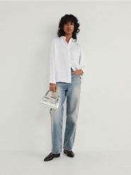 Satynowa koszula - złamana biel. Koszule damskie Reserved, l, bez wzorów, z satyny, bez kołnierzyka, bez ramiączek. W wyprzedaży za 25.99 zł.