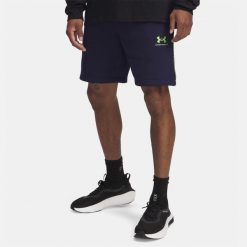 Spodenki Męskie Sportowe Under Armour Na Co Dzień Fleece Short Taping. Niebieskie szorty męskie Under Armour, bez wzorów, sportowe. Za 229.99 zł.