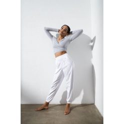 Top do jogi Moonholi Total Eclipse z długim rękawem. Szare topy damskie MOONHOLI, l, bez wzorów, bez kołnierzyka. Za 329.00 zł.