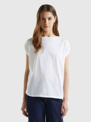 Benetton Koszulka w kolorze białym rozmiar: S. Białe t-shirty damskie Benetton, s, bez wzorów, z bawełny, bez kołnierzyka. Za 48.16 zł.