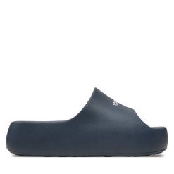 Klapki Tommy Jeans. Niebieskie klapki damskie Tommy Jeans, bez wzorów, z jeansu, bez obcasa. Za 289.99 zł.