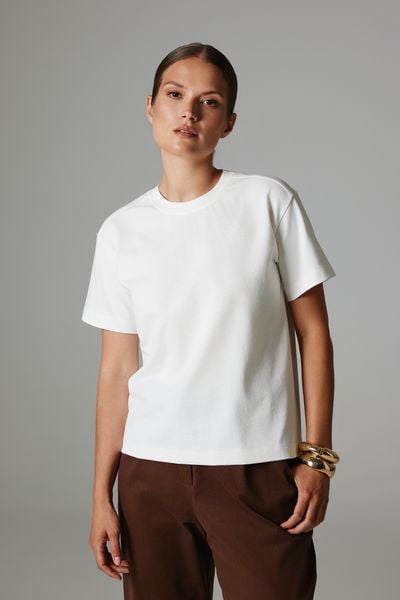 T-SHIRT KIM ECRU XL - Flawless. T-shirty damskie Flawless, uniwersalny, bez wzorów, z bawełny, bez kołnierzyka. Za 219.00 zł.