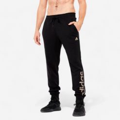 Spodnie męskie ADIDAS Gym & Pilates. Brązowe spodnie sportowe męskie Adidas, z bawełny. Za 169.99 zł.