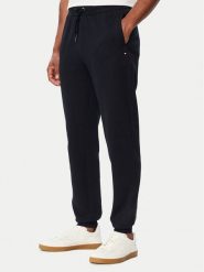 Tommy Hilfiger Spodnie dresowe Essential MW0MW44990 Granatowy Regular Fit. Niebieskie spodnie dresowe męskie Tommy Hilfiger, bez wzorów, z bawełny. Za 529.99 zł.