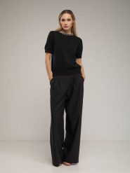 Tantra Spodnie w kolorze czarnym rozmiar: L. Czarne spodnie materiałowe damskie Tantra, bez wzorów, z materiału, z podwyższonym stanem. Za 183.15 zł.