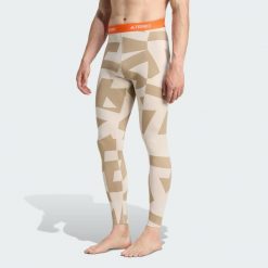 Legginsy bazowe Multi Synthetic Base Layer. Brązowe legginsy damskie Adidas, uniwersalny, bez wzorów. Za 219.00 zł.