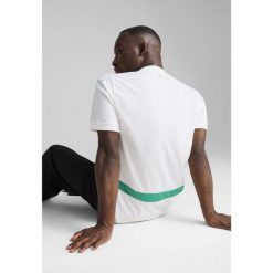 Męska koszulka domowa Senegal 2025 PUMA White Sport Green. Białe t-shirty sportowe męskie Puma, m, bez ramiączek, do piłki nożnej. Za 398.50 zł.