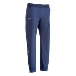 Spodnie treningowe do hokeja na trawie damskie Korok FH900. Niebieskie spodnie materiałowe damskie KOROK, bez wzorów, z elastanu, sportowe. Za 159.99 zł.